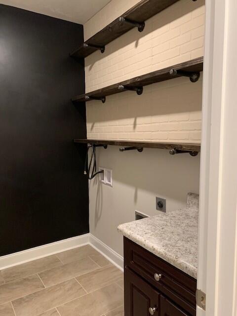 1285 Moose Club Road Thomson, GA 30824 - Photo 10 of 21 Custom laundry room with plenty of shelves