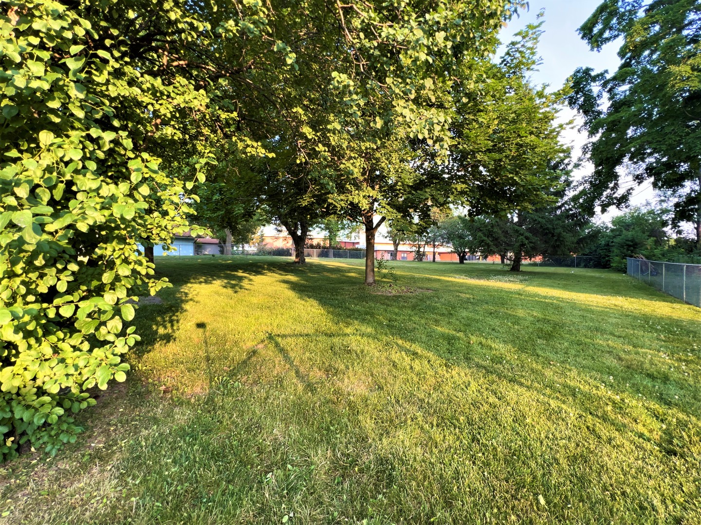 605 Old Orchard Road Harvard, IL 60033 - Photo 3 of 3 a view of yard with swimming pool and green space