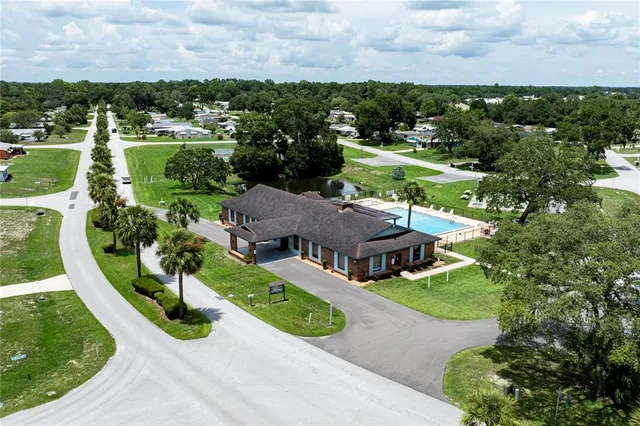 an aerial view of a house with outdoor space garden