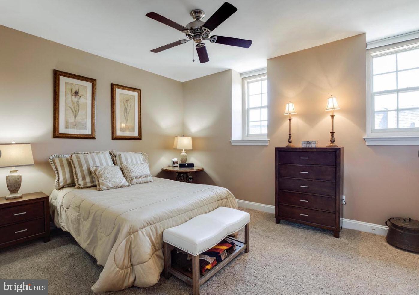 503 Rampart Way, Unit 16 Oxon Hill, MD 20745 - Photo 15 of 35 a bedroom with a bed and a dresser