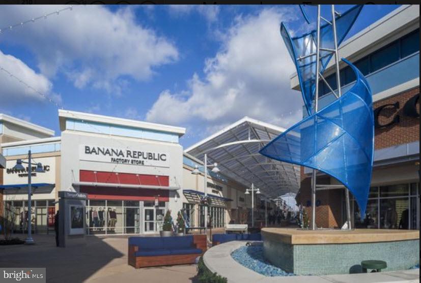 503 Rampart Way, Unit 16 Oxon Hill, MD 20745 - Photo 28 of 35 a large building with an entrance