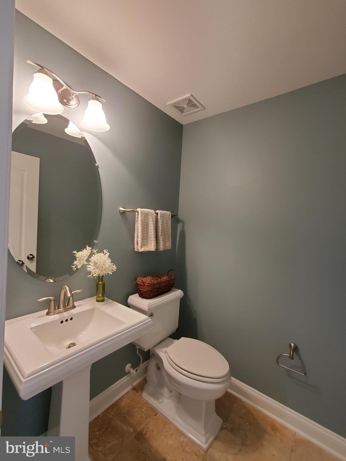 503 Rampart Way, Unit 16 Oxon Hill, MD 20745 - Photo 8 of 35 a bathroom with a sink mirror and toilet