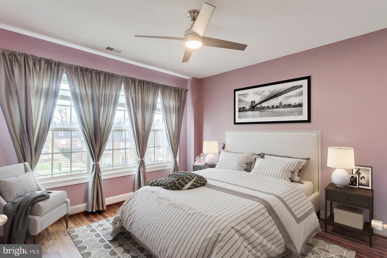 503 Rampart Way, Unit 16 Oxon Hill, MD 20745 - Photo 10 of 35 a bedroom with a large bed and a window