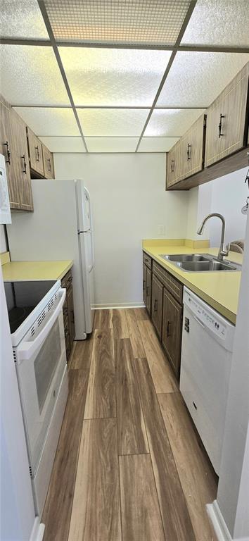12200 Vonn Road, Unit 1305 Largo, FL 33774 - Photo 13 of 22 a utility room with sink dryer and washer