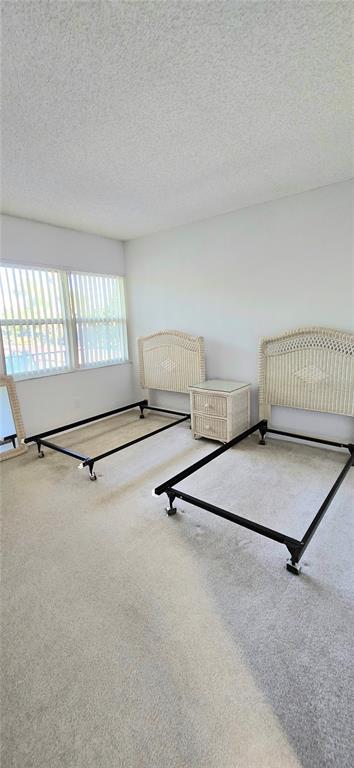 12200 Vonn Road, Unit 1305 Largo, FL 33774 - Photo 16 of 22 a room with gym equipment and a window