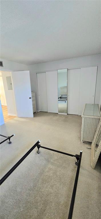 12200 Vonn Road, Unit 1305 Largo, FL 33774 - Photo 17 of 22 a view of a livingroom with a staircase