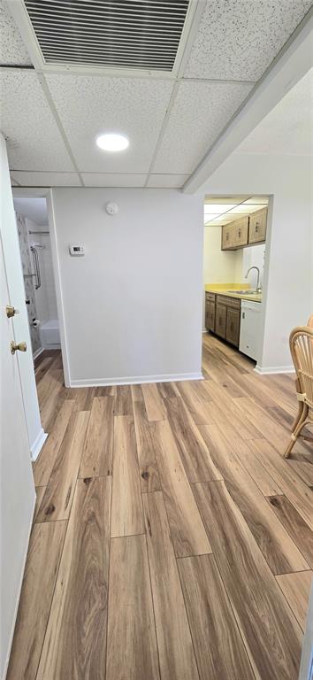 12200 Vonn Road, Unit 1305 Largo, FL 33774 - Photo 9 of 22 a view of empty room with wooden floor