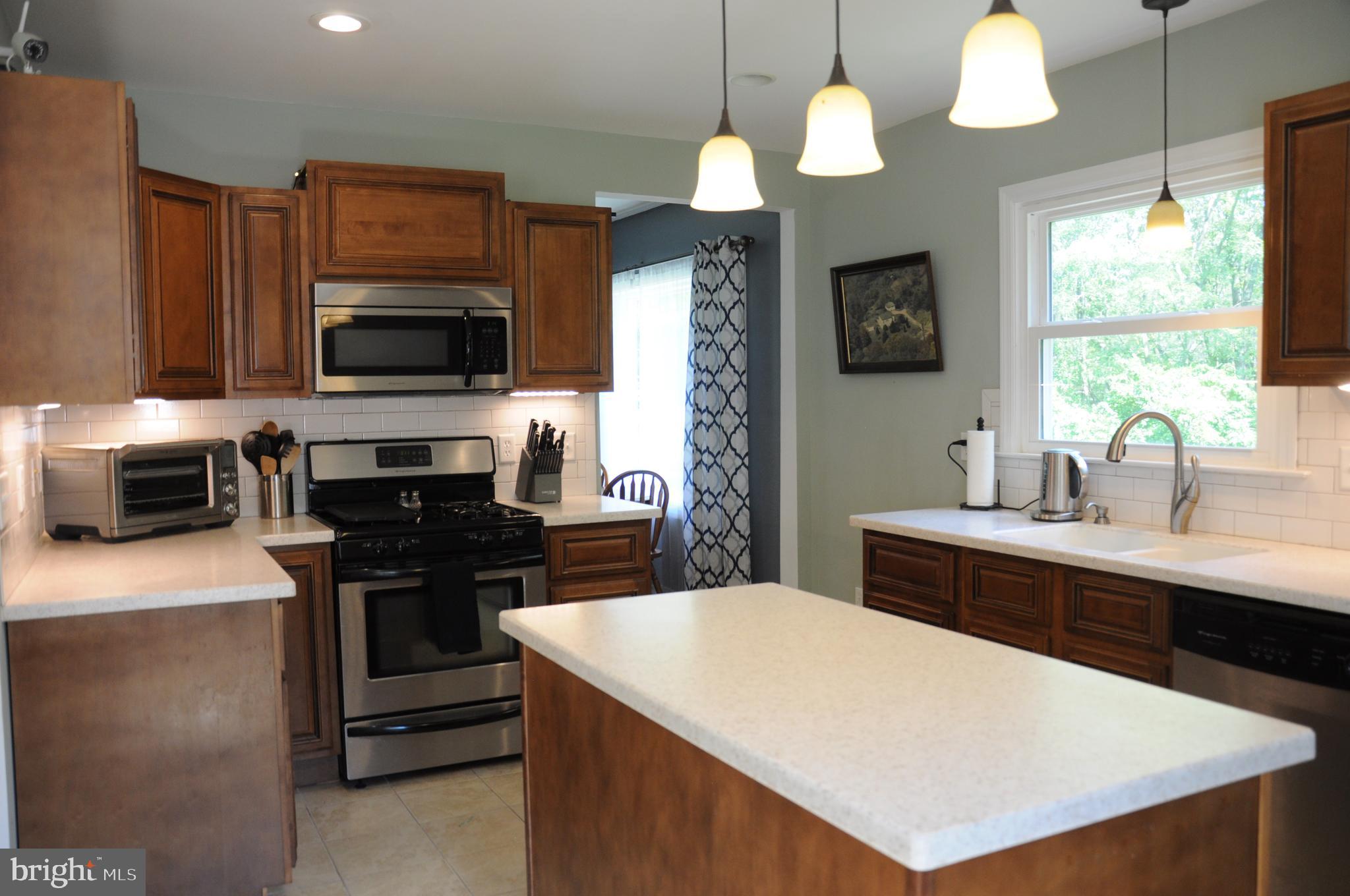 845 Red Toad Road North East, MD 21901 - Photo 7 of 36 solid surface counters, ceramic backsplash