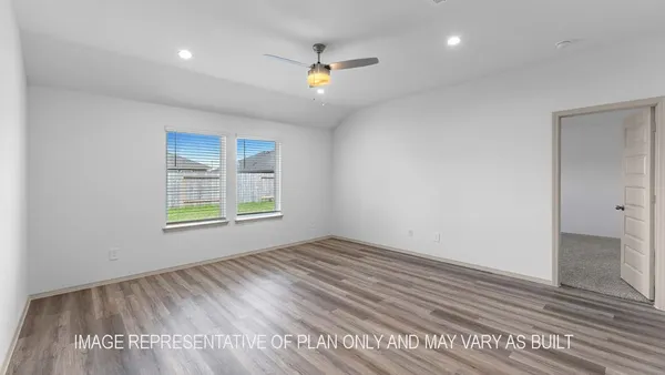 a view of kitchen view with cabinets and wooden floor