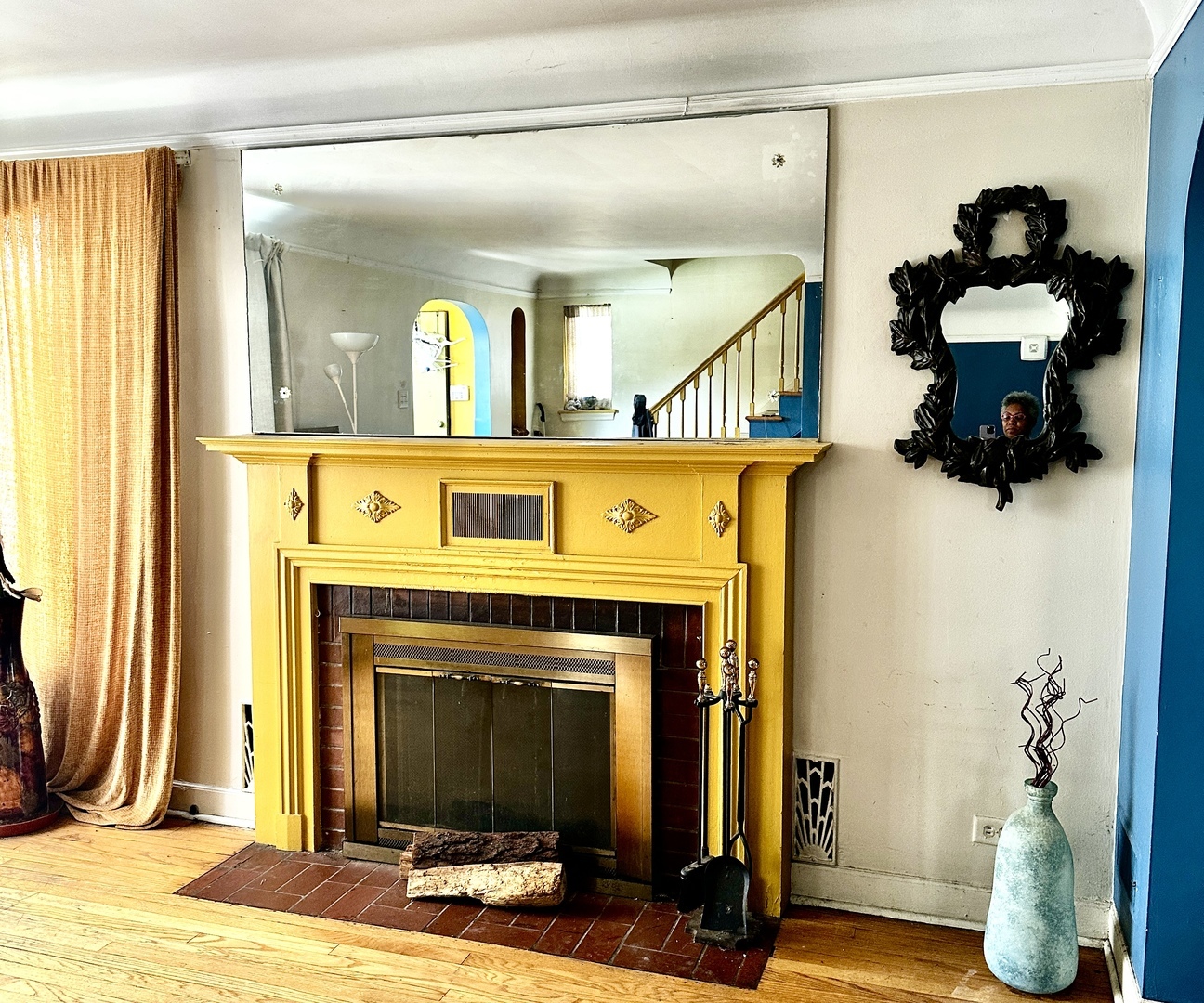 1706 East 83rd Street Chicago, IL 60617 - Photo 4 of 8 a view of a livingroom with furniture and a fireplace