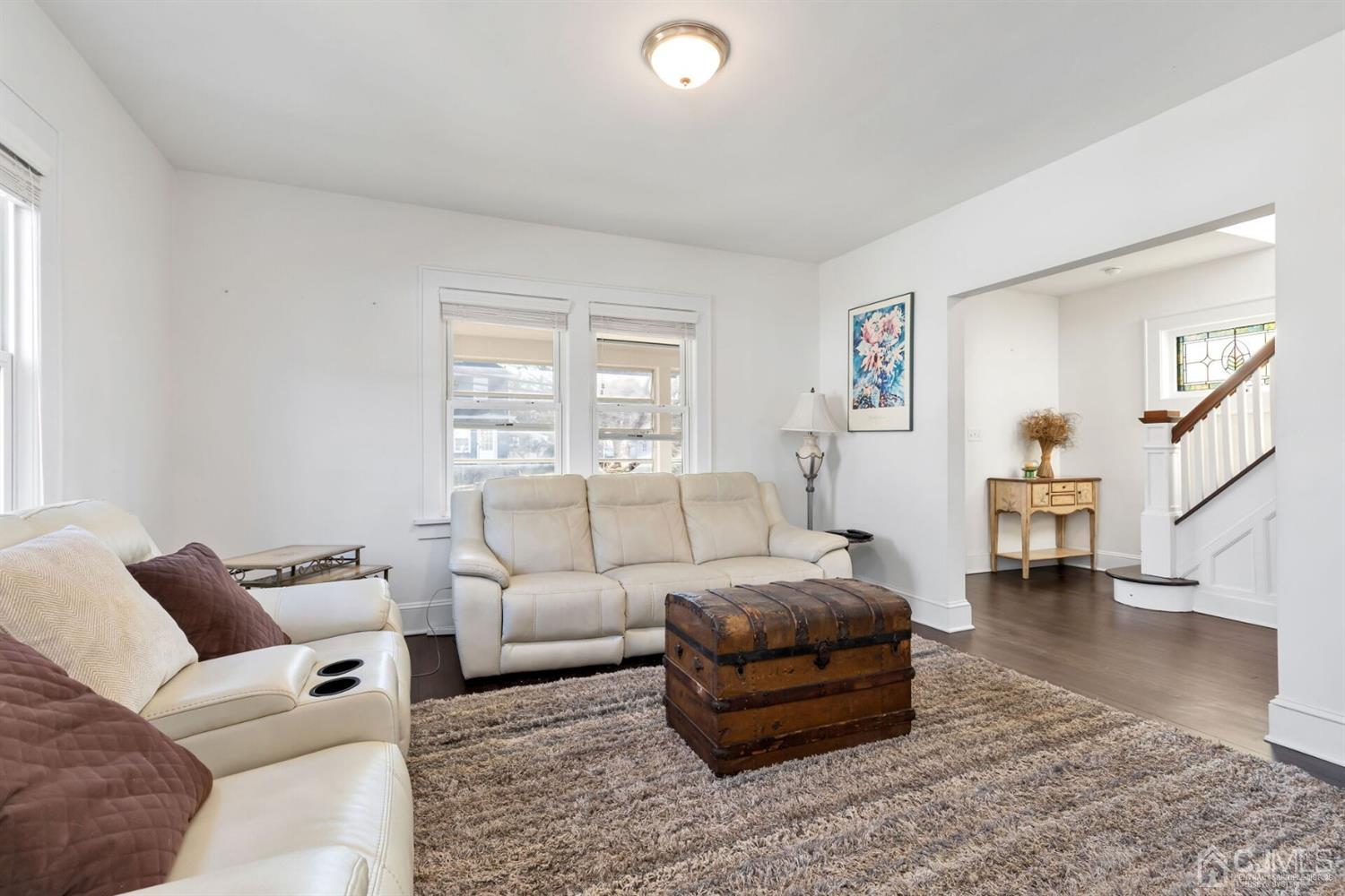 323 Washington Road Sayreville, NJ 08872 - Photo 11 of 40 a living room with furniture and a couch
