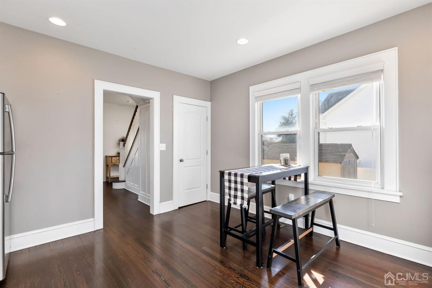323 Washington Road Sayreville, NJ 08872 - Photo 17 of 40 a view of a livingroom with furniture and wooden floor