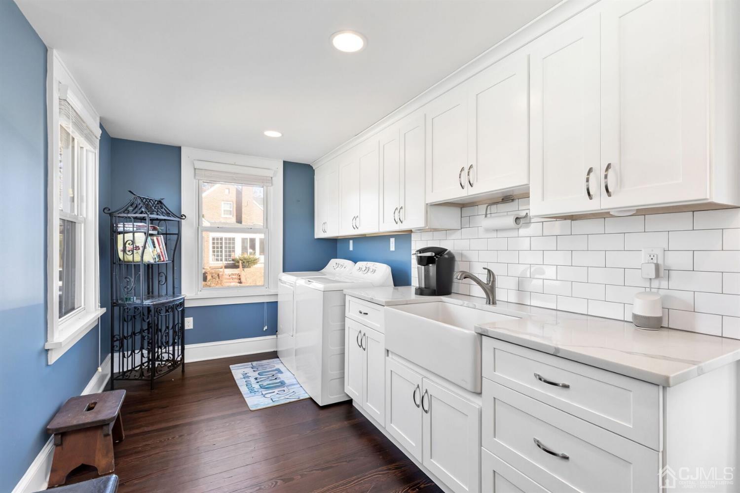 323 Washington Road Sayreville, NJ 08872 - Photo 19 of 40 a kitchen with white cabinets and window