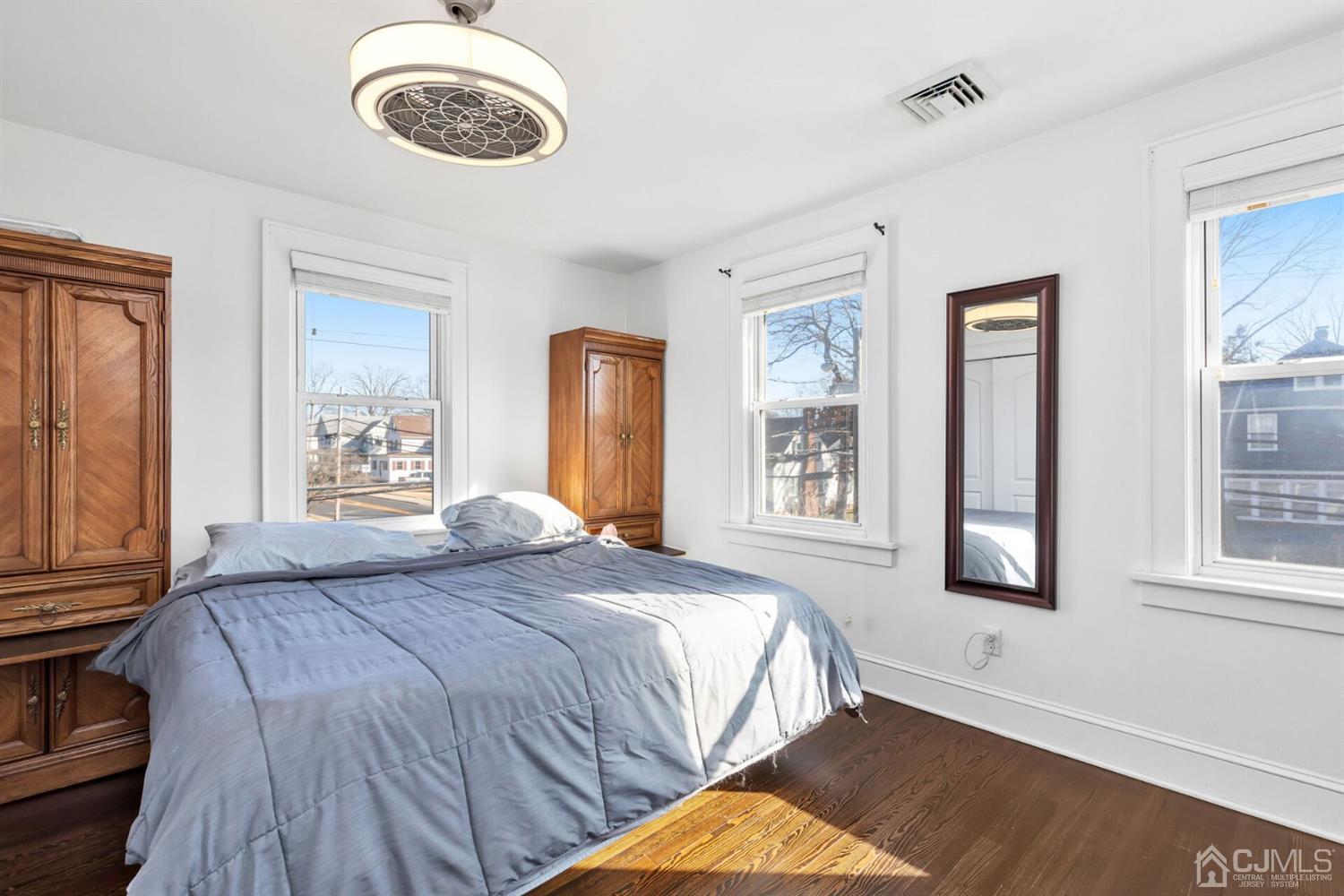 323 Washington Road Sayreville, NJ 08872 - Photo 24 of 40 a bedroom with a bed and a window
