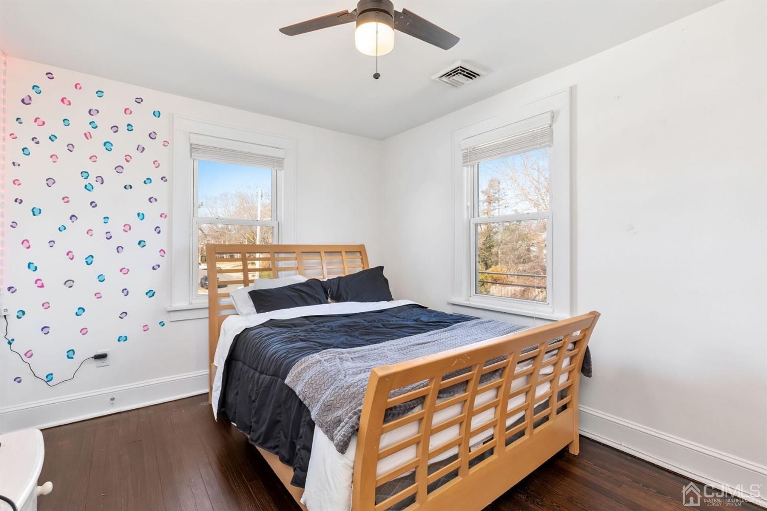 323 Washington Road Sayreville, NJ 08872 - Photo 26 of 40 a bedroom with a bed and a window