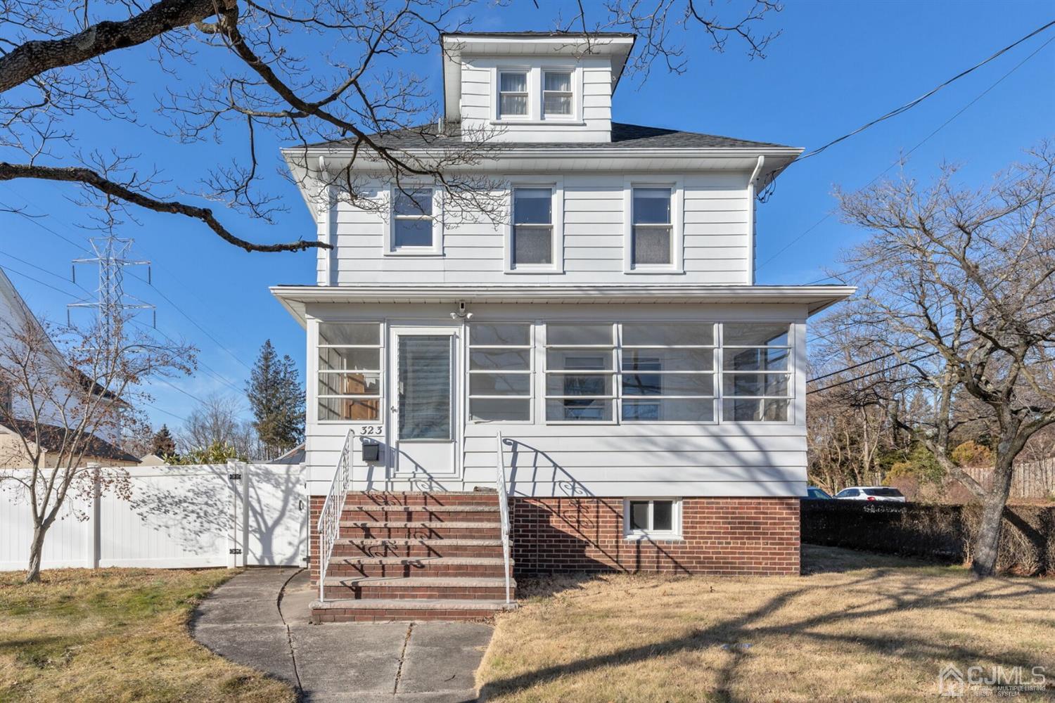 323 Washington Road Sayreville, NJ 08872 - Photo 33 of 40 front view of a house with a yard
