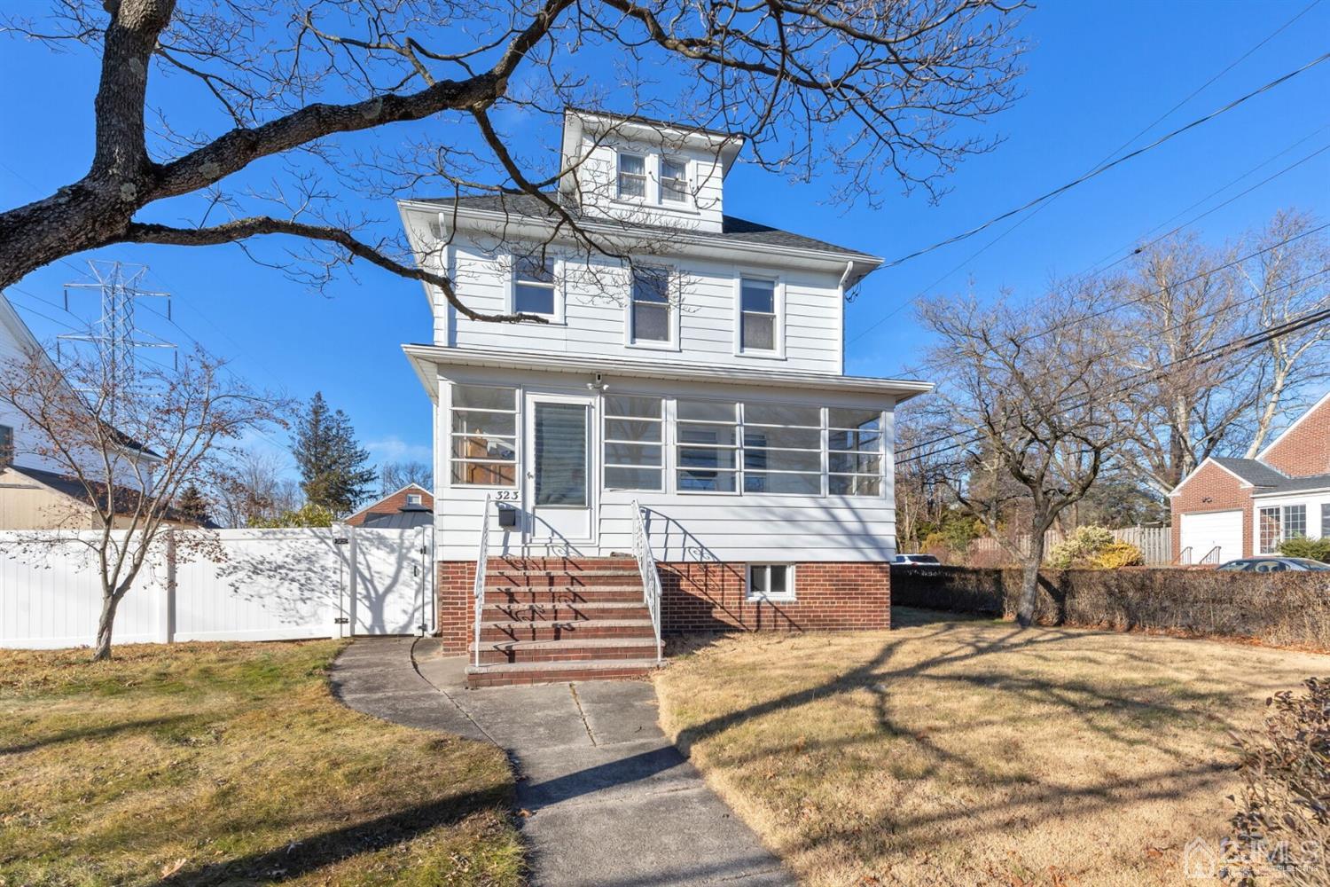323 Washington Road Sayreville, NJ 08872 - Photo 34 of 40 a view of a house with a patio