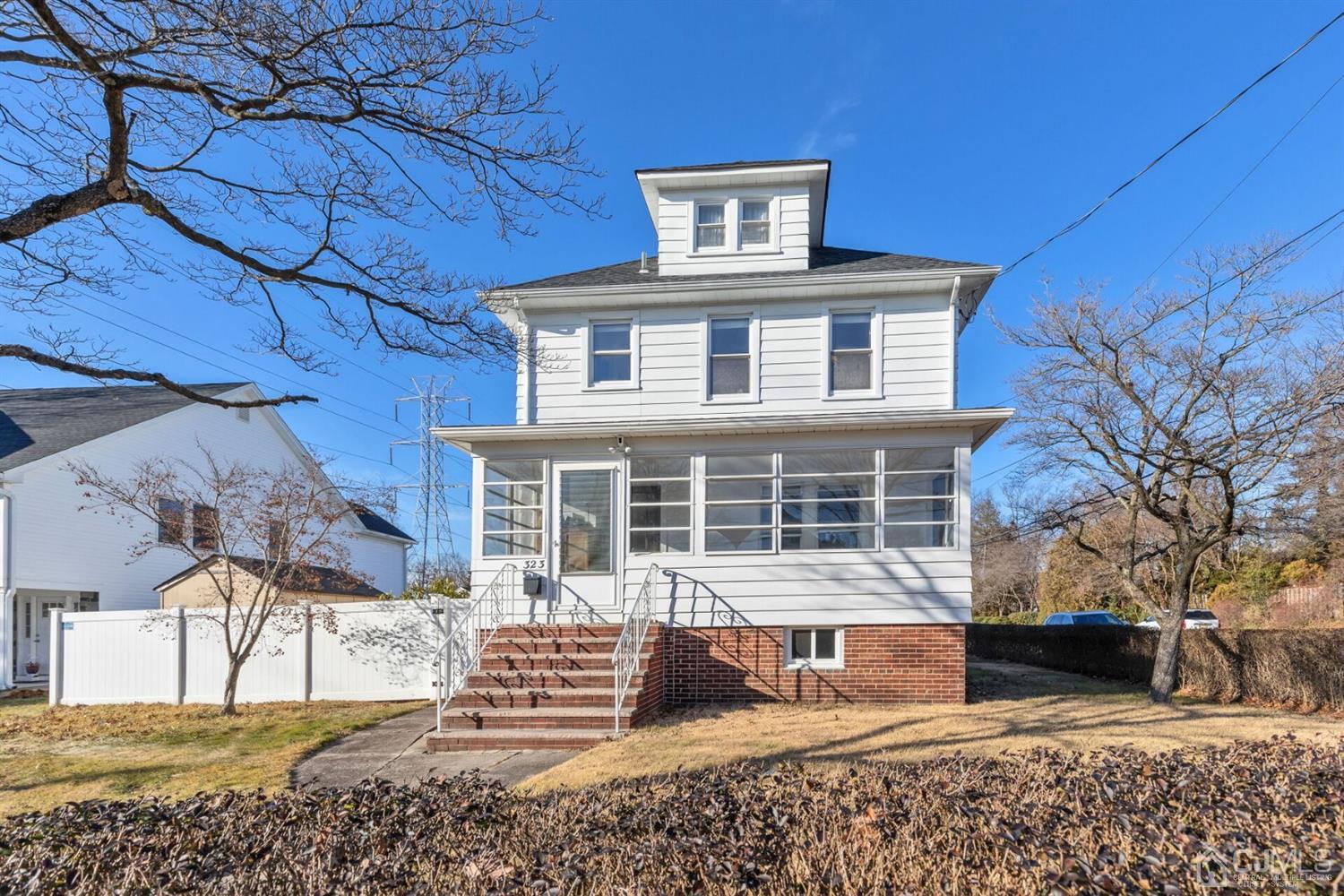 323 Washington Road Sayreville, NJ 08872 - Photo 35 of 40 a front view of a house with a yard