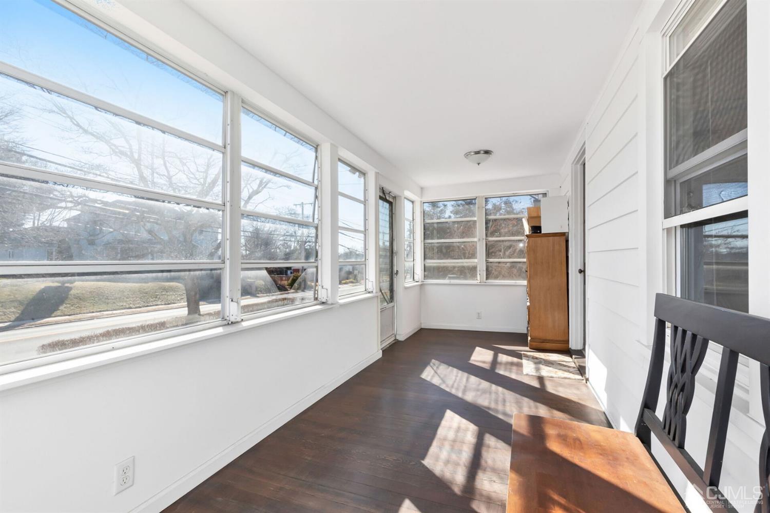 323 Washington Road Sayreville, NJ 08872 - Photo 4 of 40 a living room with a large window