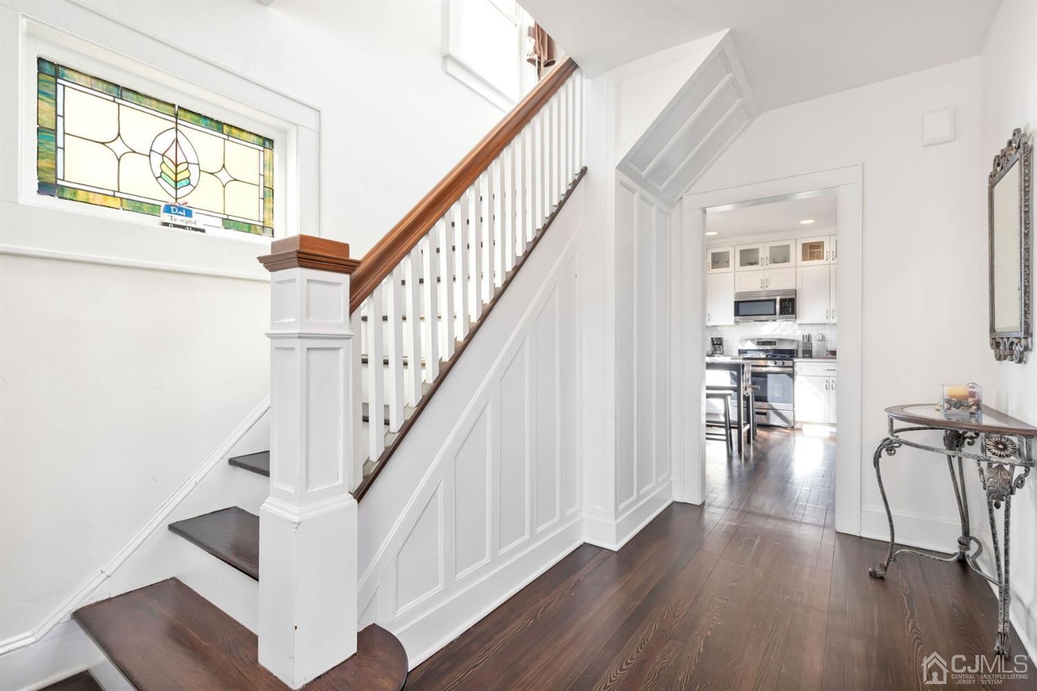 323 Washington Road Sayreville, NJ 08872 - Photo 5 of 40 a view of entryway and hall with wooden floor