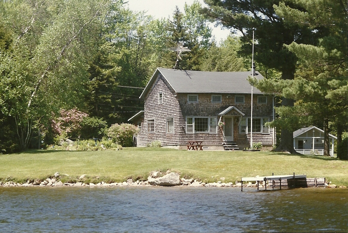11 Access Road Road, Unit 2 Windsor, MA 01270 - Photo 1 of 11 a view of a house with garden and swimming pool