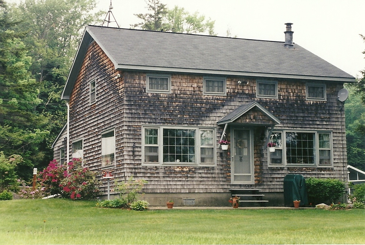 11 Access Road Road, Unit 2 Windsor, MA 01270 - Photo 2 of 11 a front view of a house with a garden