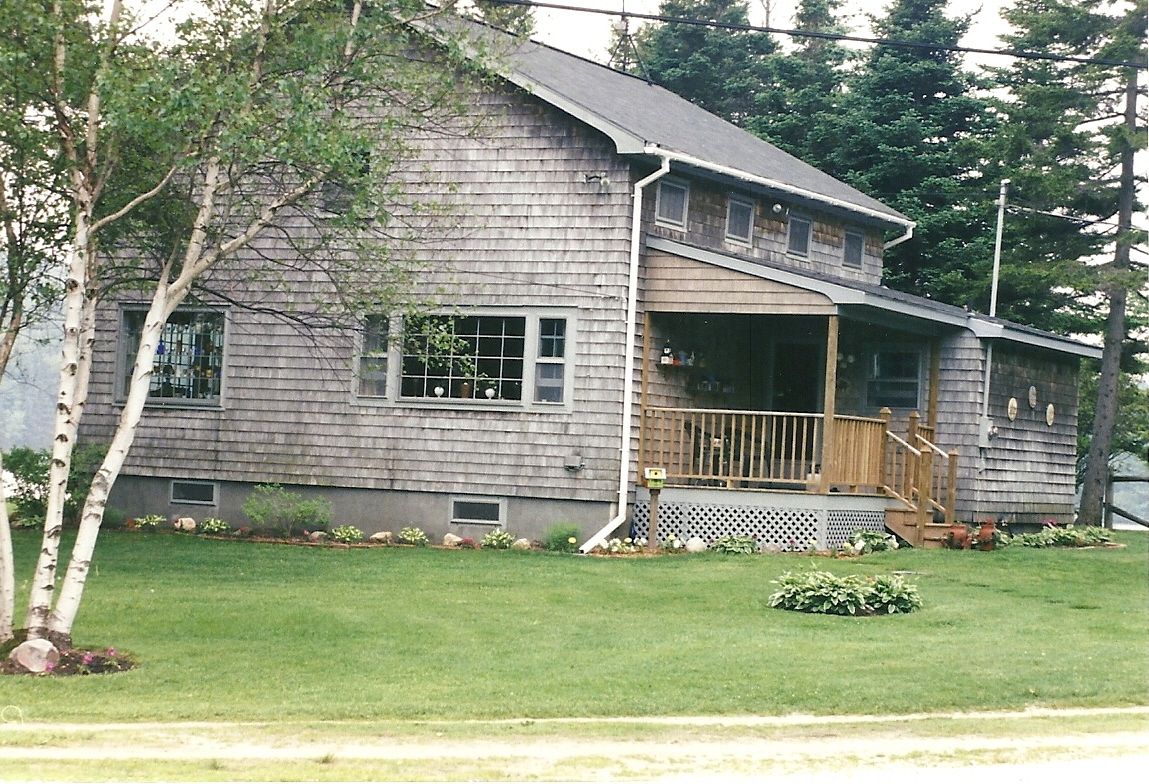 11 Access Road Road, Unit 2 Windsor, MA 01270 - Photo 3 of 11 a front view of a house with a garden