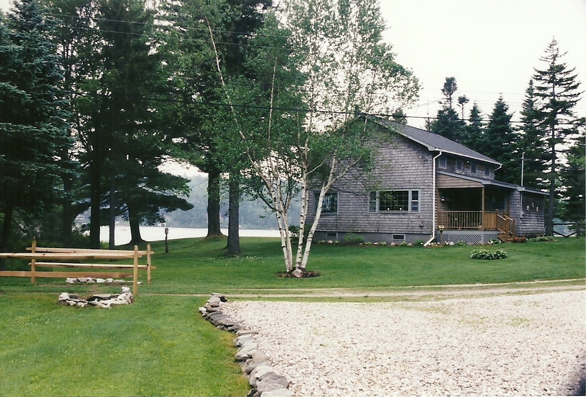 11 Access Road Road, Unit 2 Windsor, MA 01270 - Photo 10 of 11 a view of a house with a backyard