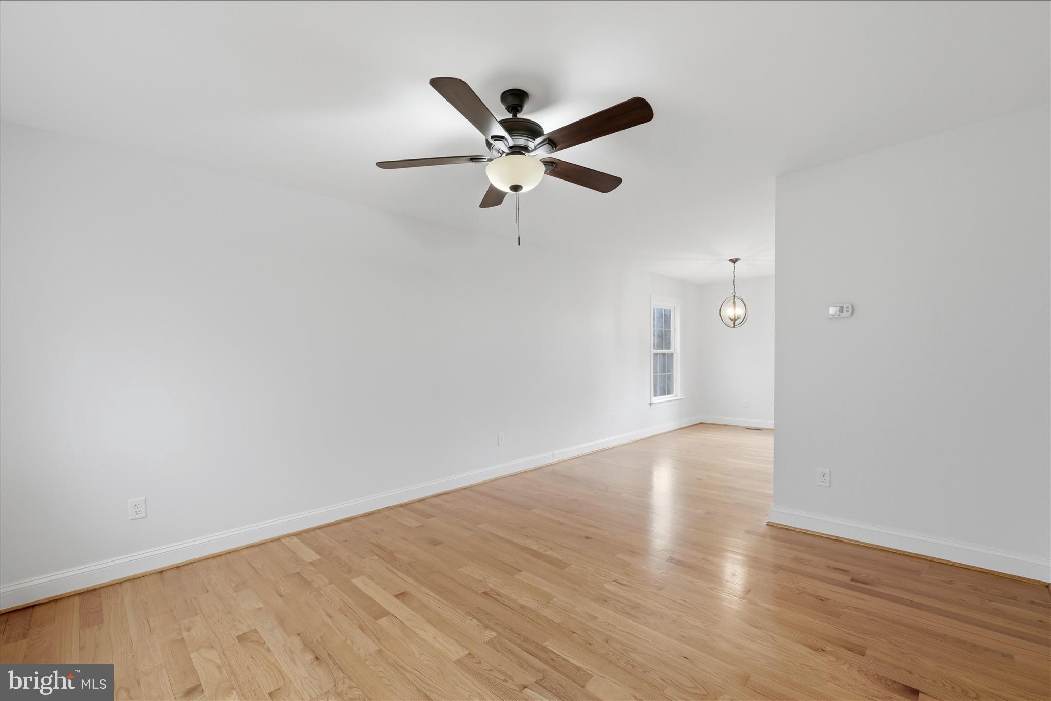145 Graywolf Trail Winchester, VA 22602 - Photo 18 of 56 a view of a ceiling fan with wooden floor