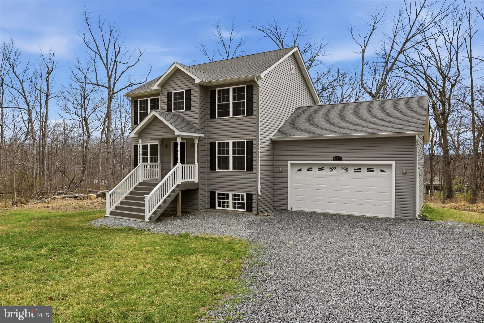 145 Graywolf Trail Winchester, VA 22602 - Photo 2 of 56 a front view of a house with a yard