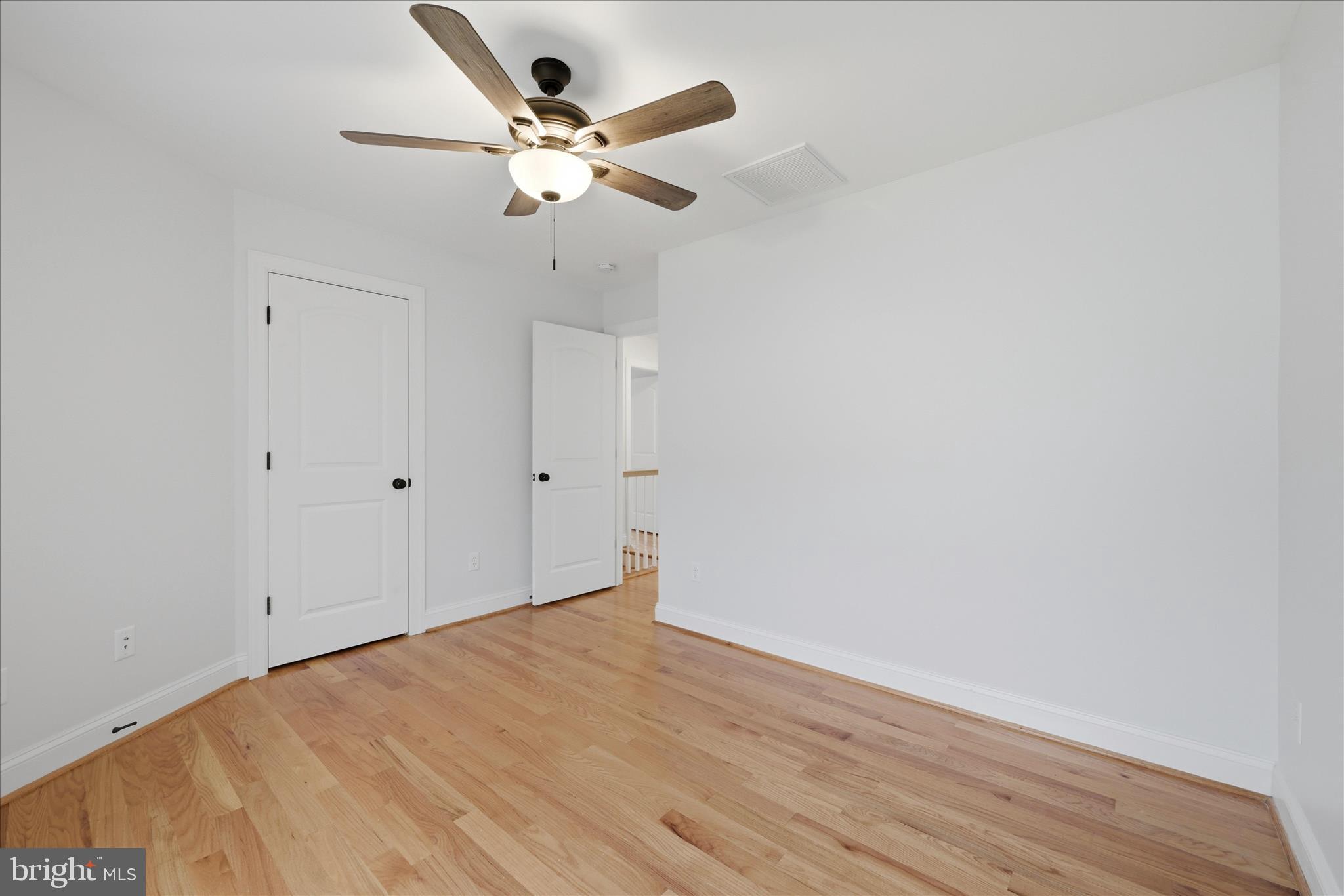 145 Graywolf Trail Winchester, VA 22602 - Photo 29 of 56 wooden floor in an empty room