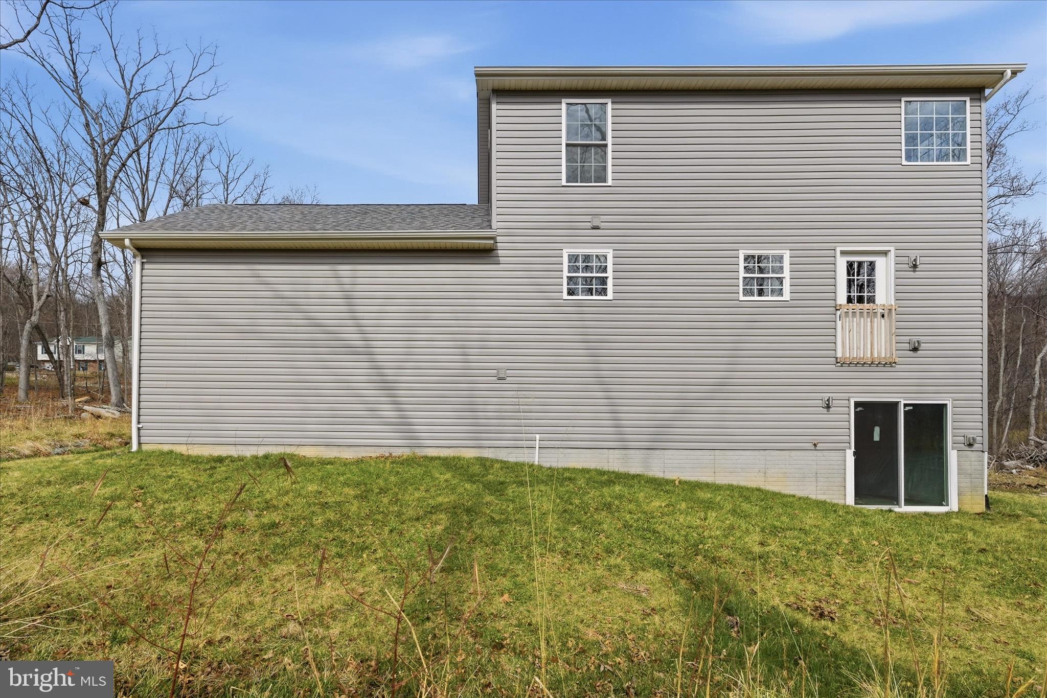 145 Graywolf Trail Winchester, VA 22602 - Photo 44 of 56 a view of a house with a yard