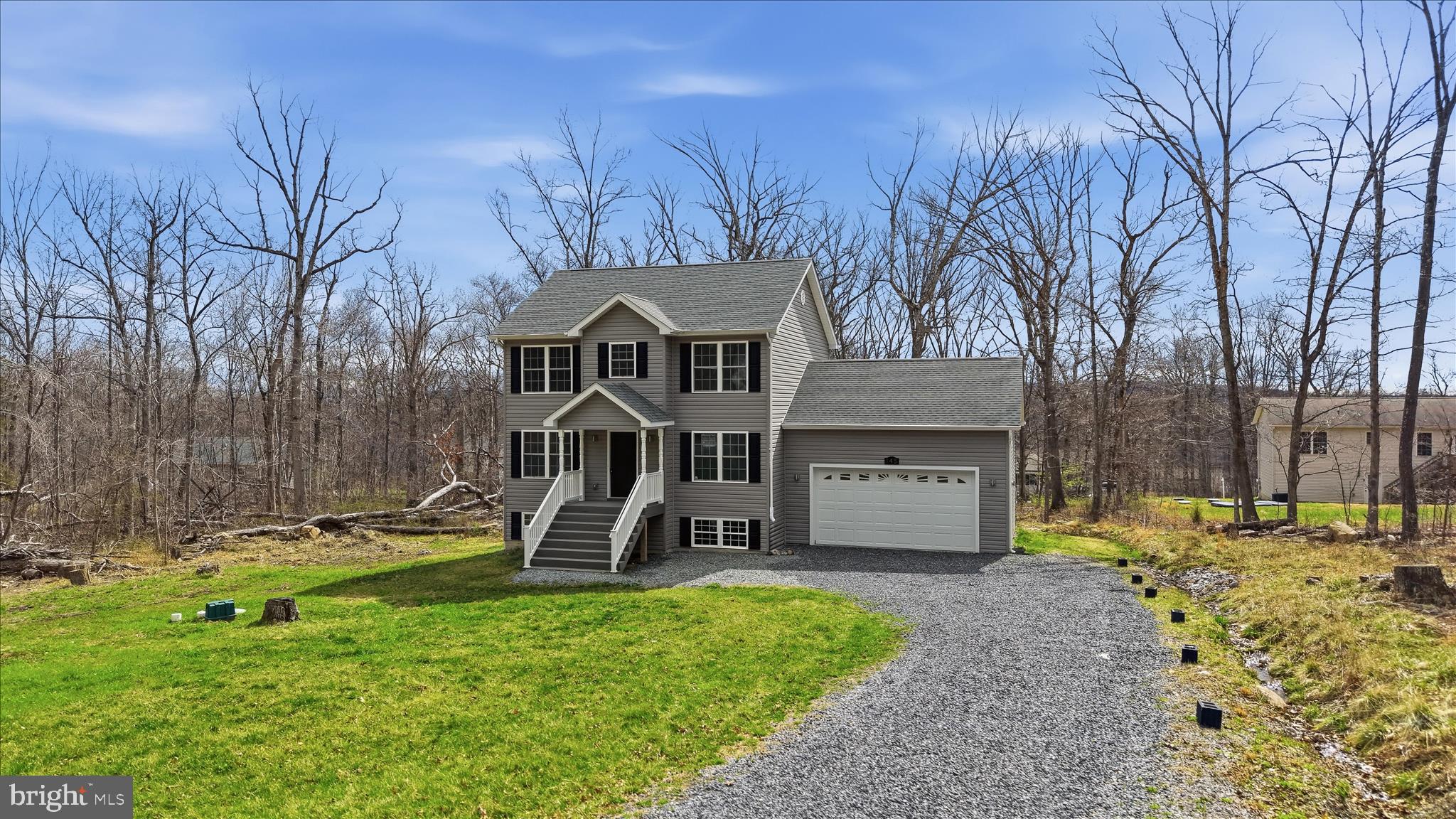 145 Graywolf Trail Winchester, VA 22602 - Photo 48 of 56 front view of a house with a yard