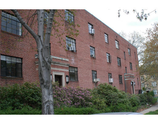 40 Stetson Street, Unit 3 Brookline, MA 02446 - Photo 1 of 1 a front view of a building with plants