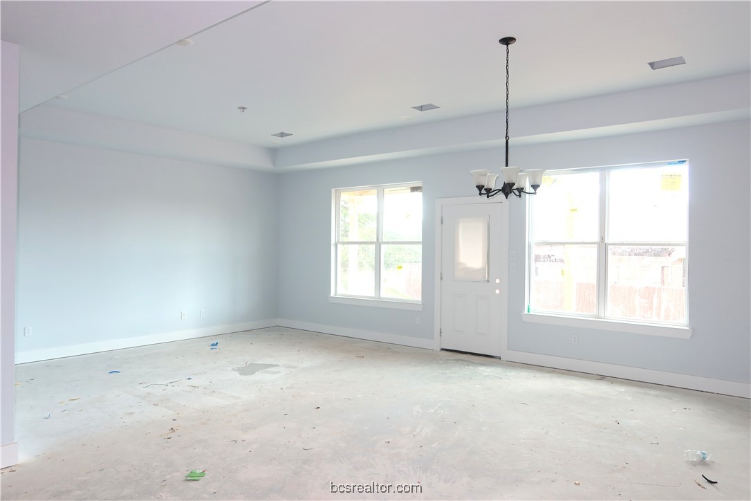 2006 Reagan Court Bryan, TX 77802 - Photo 6 of 17 a view of an empty room with a window