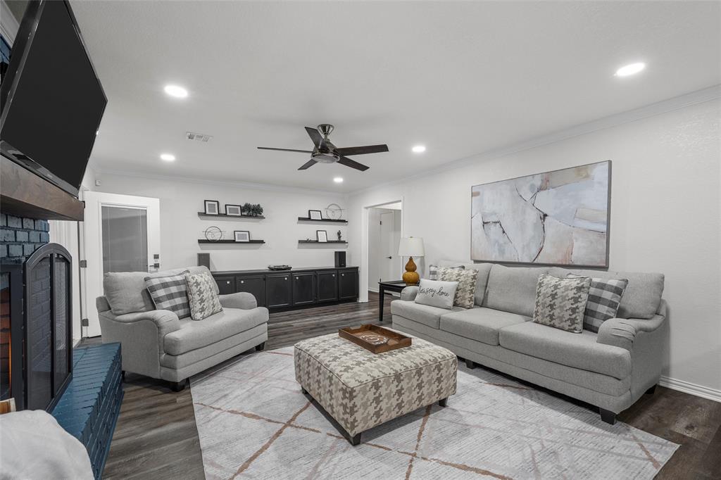 5704 Silver Lake Circle Waco, TX 76710 - Photo 11 of 36 a living room with furniture and a flat screen tv