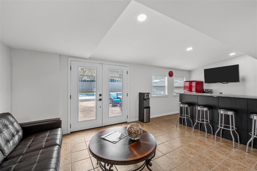 5704 Silver Lake Circle Waco, TX 76710 - Photo 15 of 36 a living room with furniture and a flat screen tv