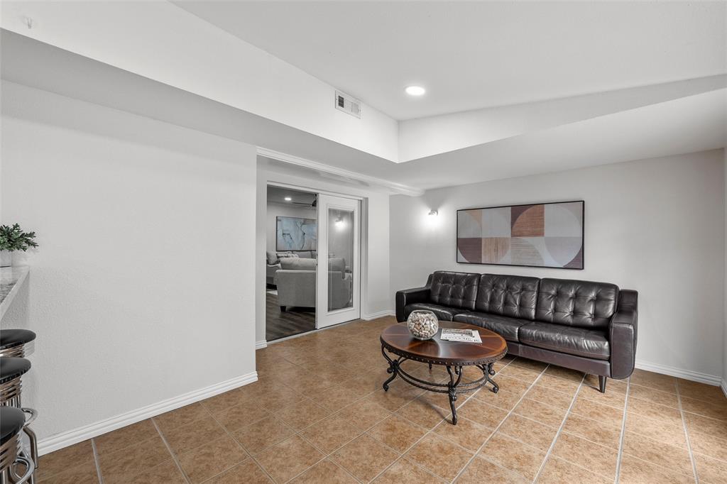5704 Silver Lake Circle Waco, TX 76710 - Photo 19 of 36 a living room with furniture and a rug