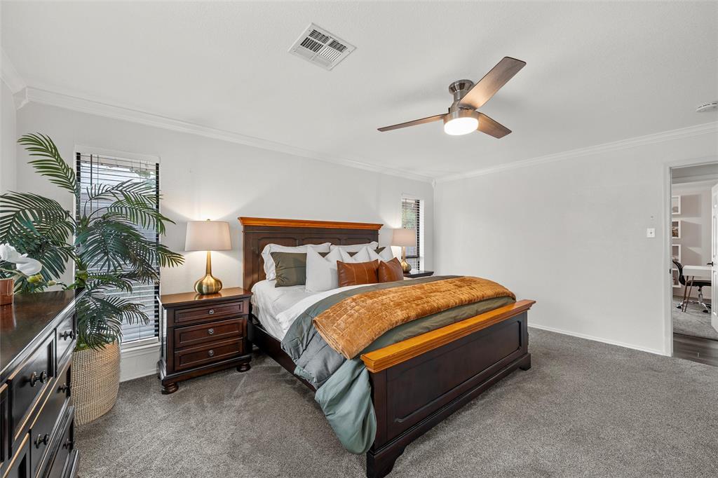 5704 Silver Lake Circle Waco, TX 76710 - Photo 21 of 36 a bed sitting in a bedroom and night stand