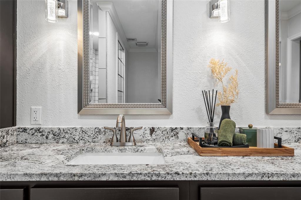 5704 Silver Lake Circle Waco, TX 76710 - Photo 25 of 36 a bathroom with sink and mirror