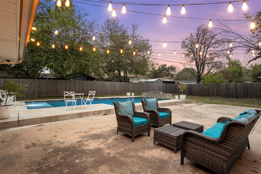 5704 Silver Lake Circle Waco, TX 76710 - Photo 6 of 36 a view of a lake with couches and wooden floor