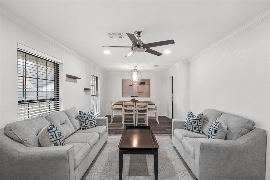 5704 Silver Lake Circle Waco, TX 76710 - Photo 8 of 36 a living room with furniture and a large window