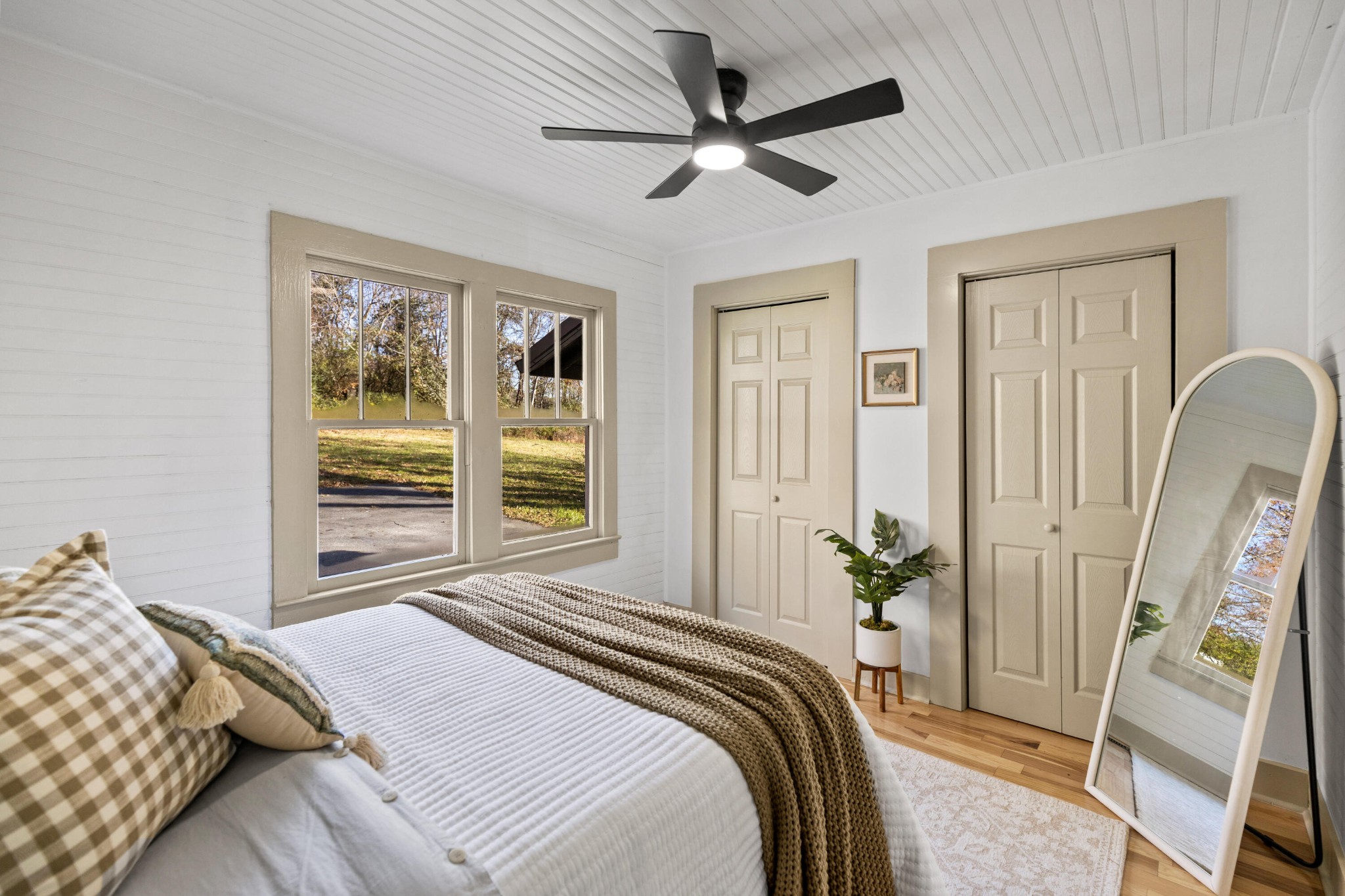 1210 Old Englewood Road Athens, TN 37303 - Photo 16 of 28 a bedroom with a bed a window and potted plant