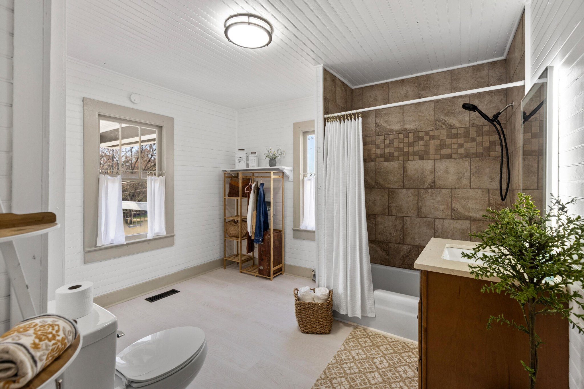 1210 Old Englewood Road Athens, TN 37303 - Photo 17 of 28 a bathroom with a sink toilet and shower