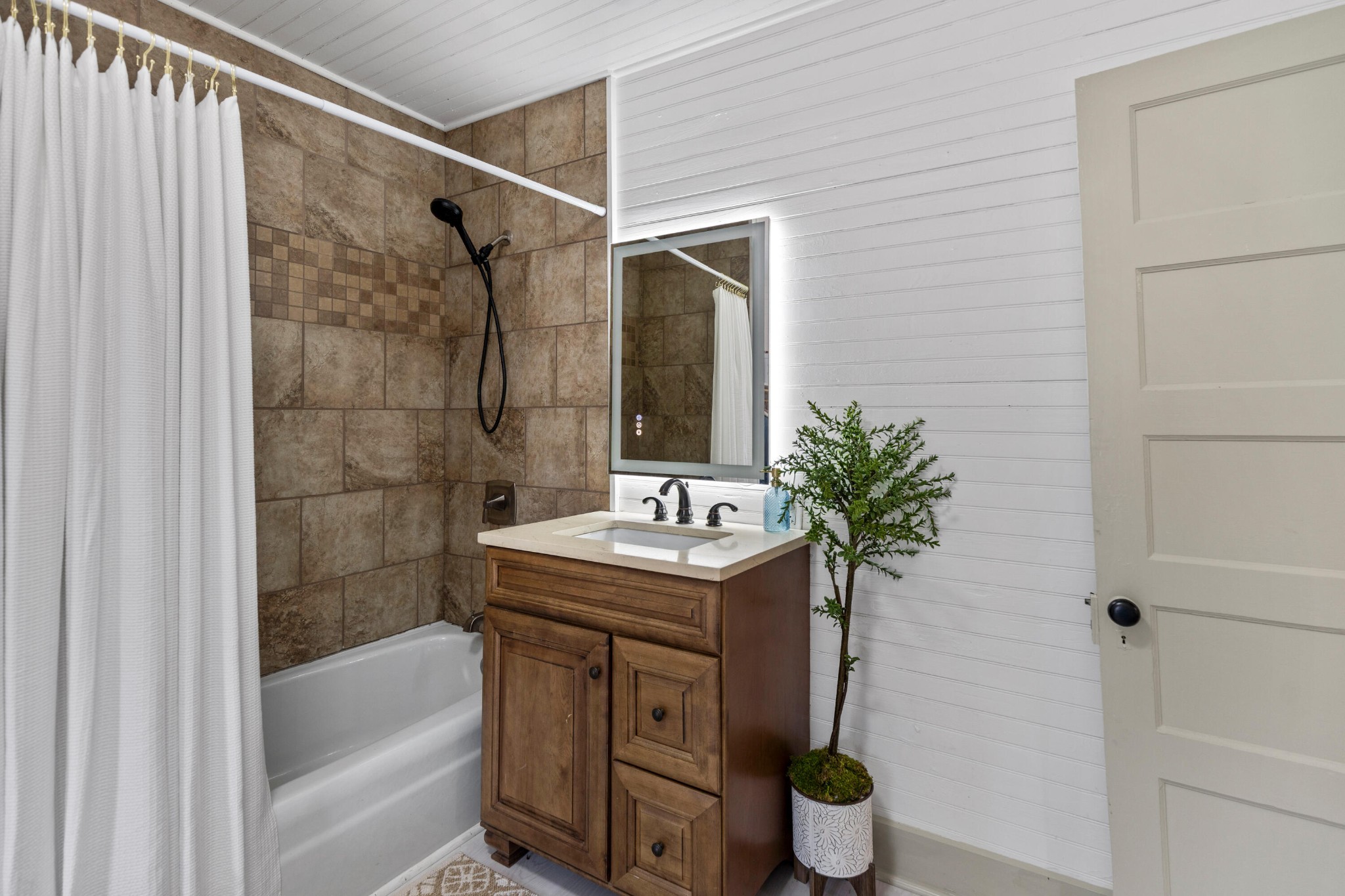1210 Old Englewood Road Athens, TN 37303 - Photo 19 of 28 a bathroom with a sink toilet and shower