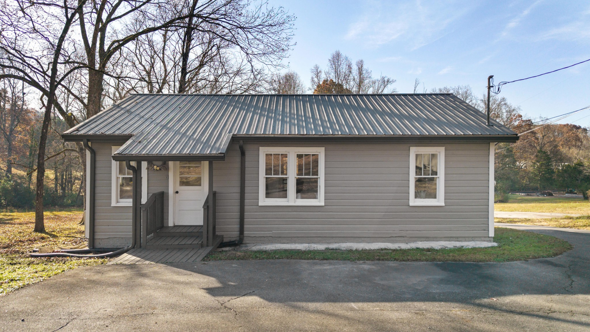 1210 Old Englewood Road Athens, TN 37303 - Photo 24 of 28 a front view of a house with a yard
