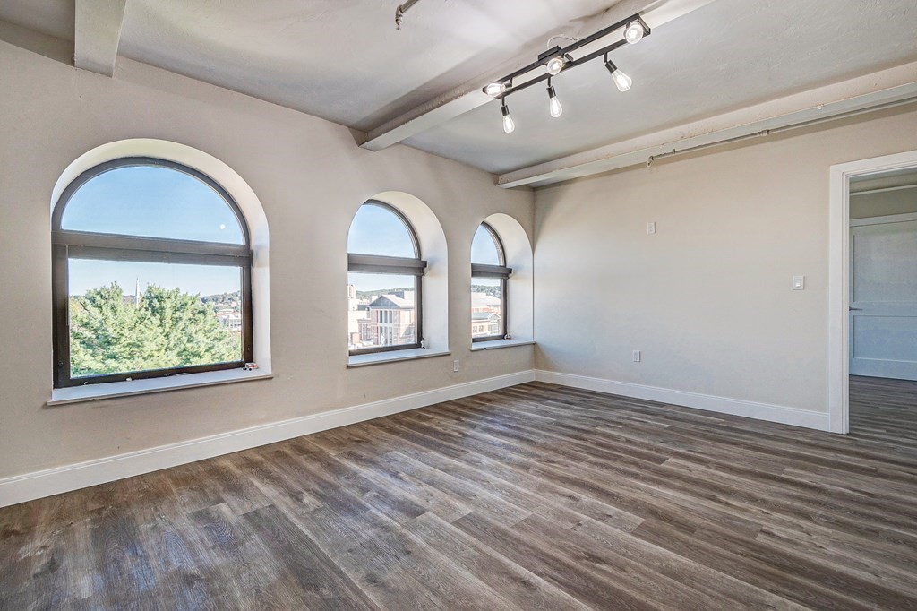 an empty room with windows