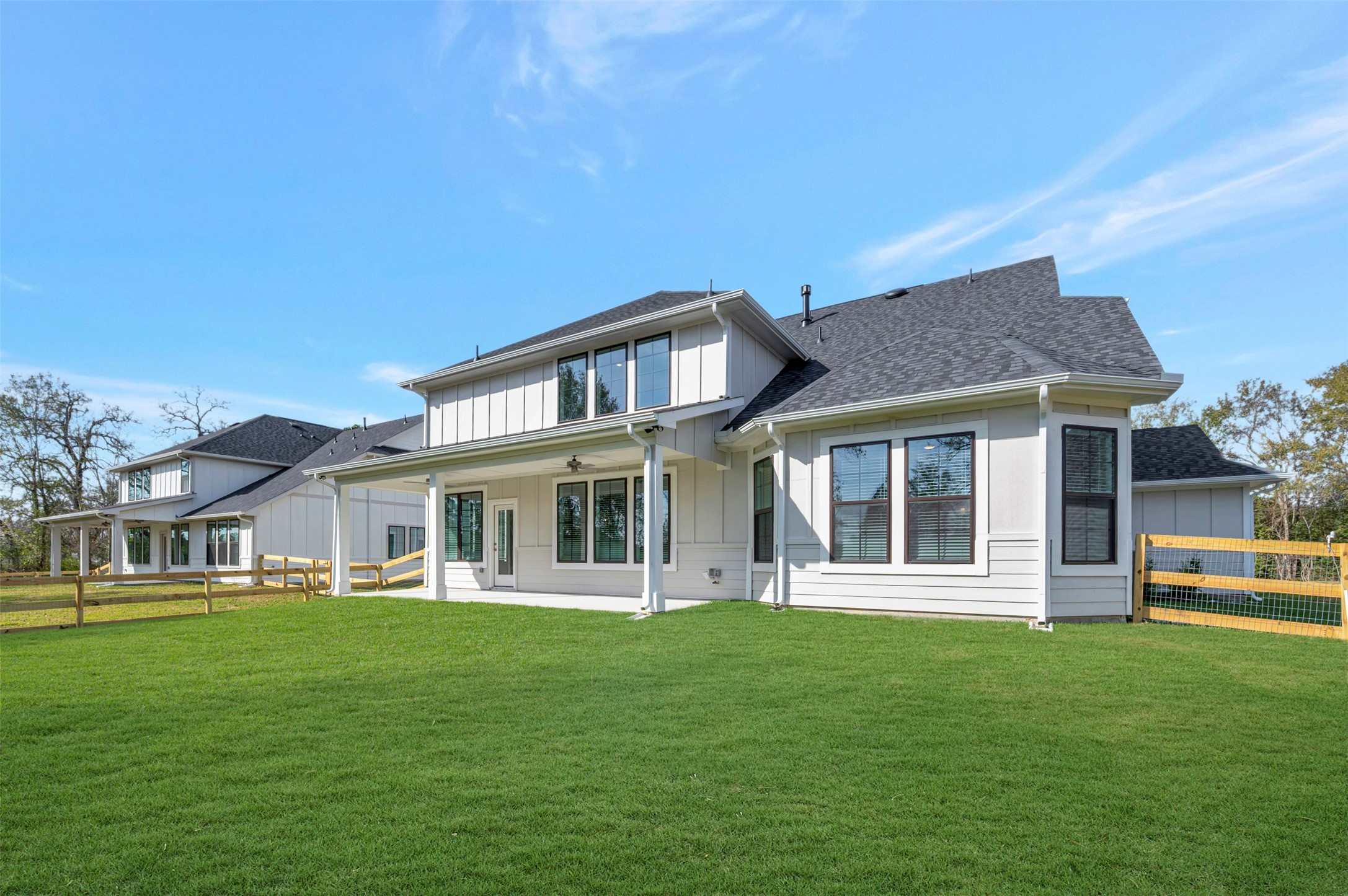 467 6th Street Magnolia, TX 77355 - Photo 10 of 50 a front view of a house with a garden