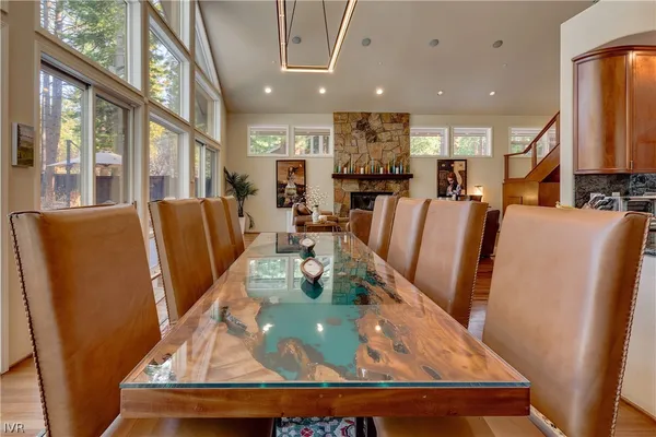 a view of a dining room with furniture window and wooden floor