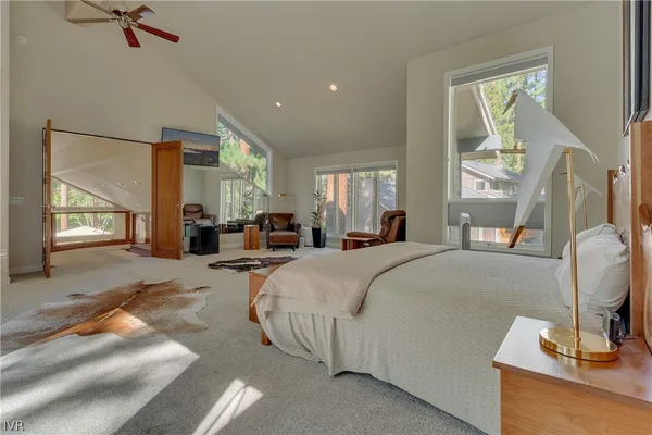 a room with gym equipment and a fireplace